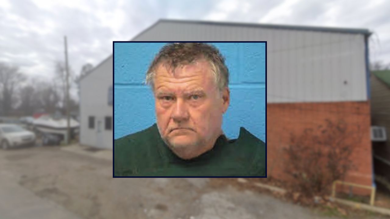 Man arrested amid search for missing woman after dead body found buried under van behind auto shop, police say